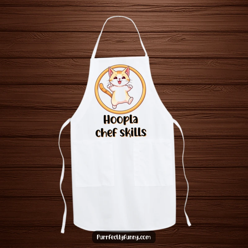 Funny apron design of a cat leaping through a hoop with a triumphant look, perfect for culinary champions.