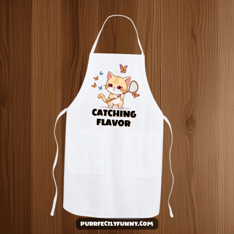 Funny apron showing a goofy cat comically equipped with a net, humorously hunting butterflies while cooking or baking in the kitchen.