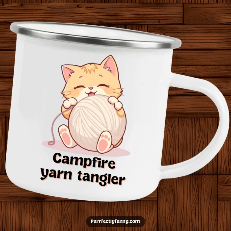 Funny Camping Mug with a cat gleefully batting a huge ball of yarn, perfect for outdoor enthusiasts.