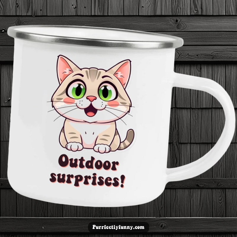 Funny cat with comically wide eyes and a huge smile on a durable enamel camping mug, perfect for outdoors.