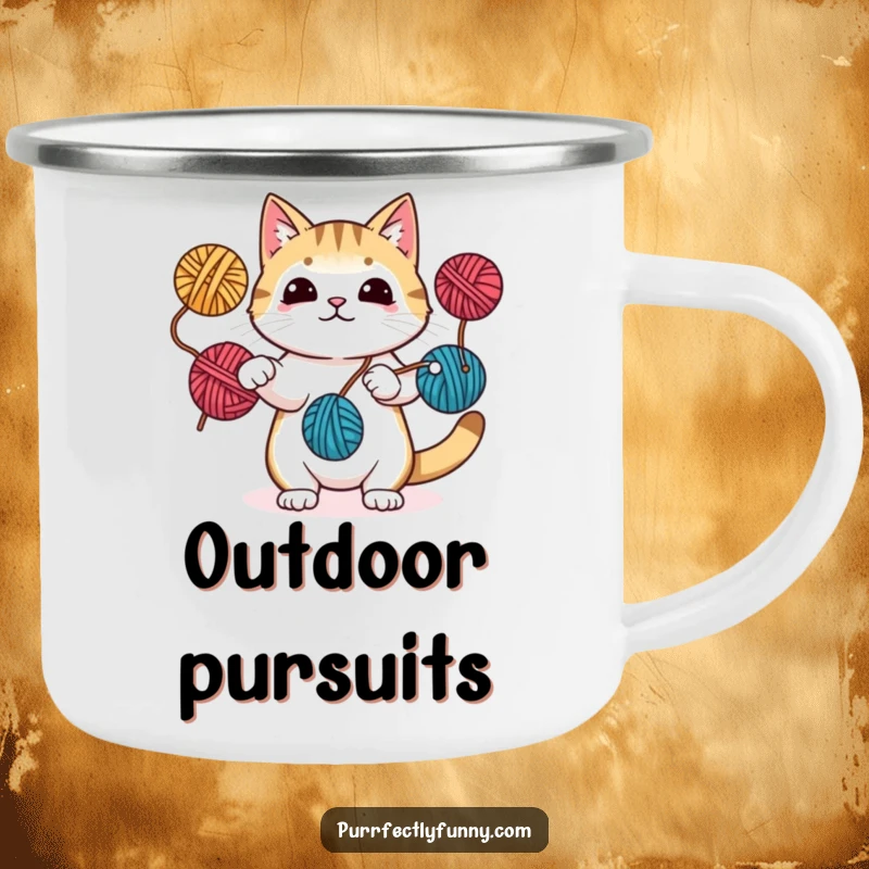 Funny camping mug showing a cat juggling yarn balls with paws and tail, perfect for enjoying drinks on the go.