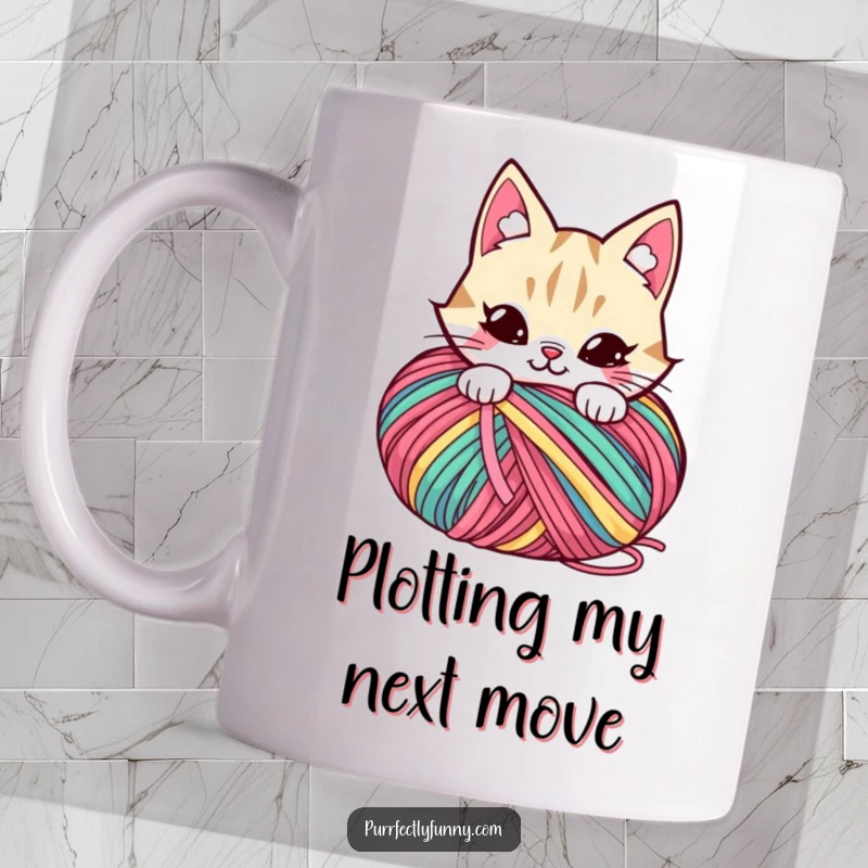 Funny mug with a cat character grinning mischievously while hiding behind a large ball of colorful yarn.