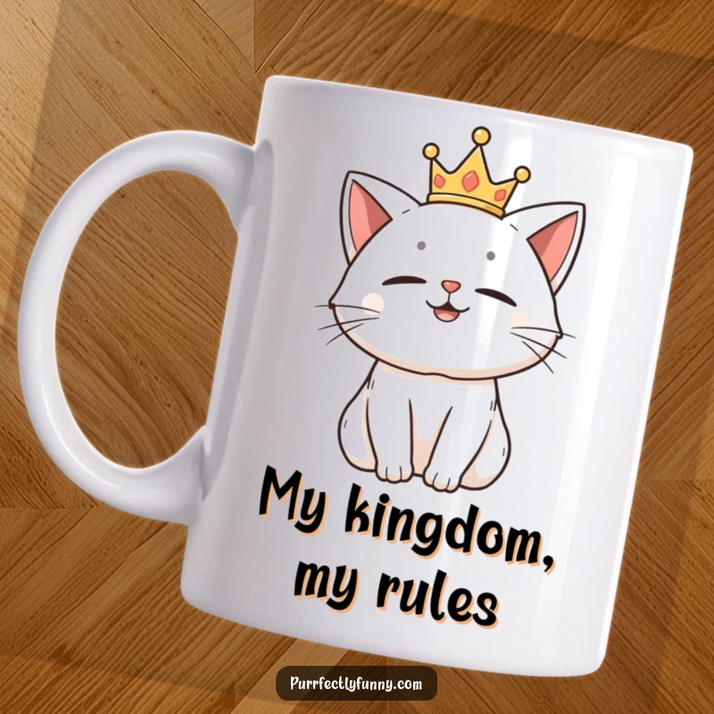 Funny mug with a smug cat wearing a tiny golden crown, looking down its nose with amusement.