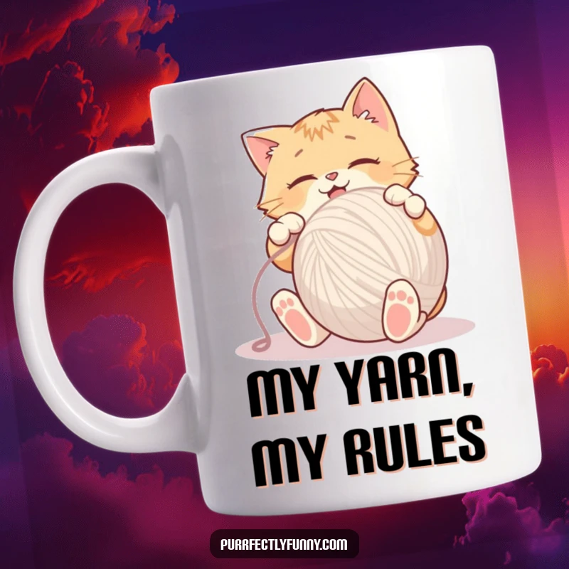 Funny Mug featuring a wildly enthusiastic cat gleefully batting a giant ball of yarn with its paws.