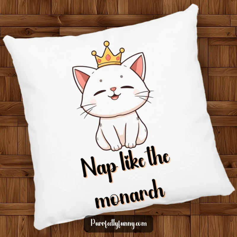 Funny pillow with a proud cat wearing a tiny crown, looking amused and content.
