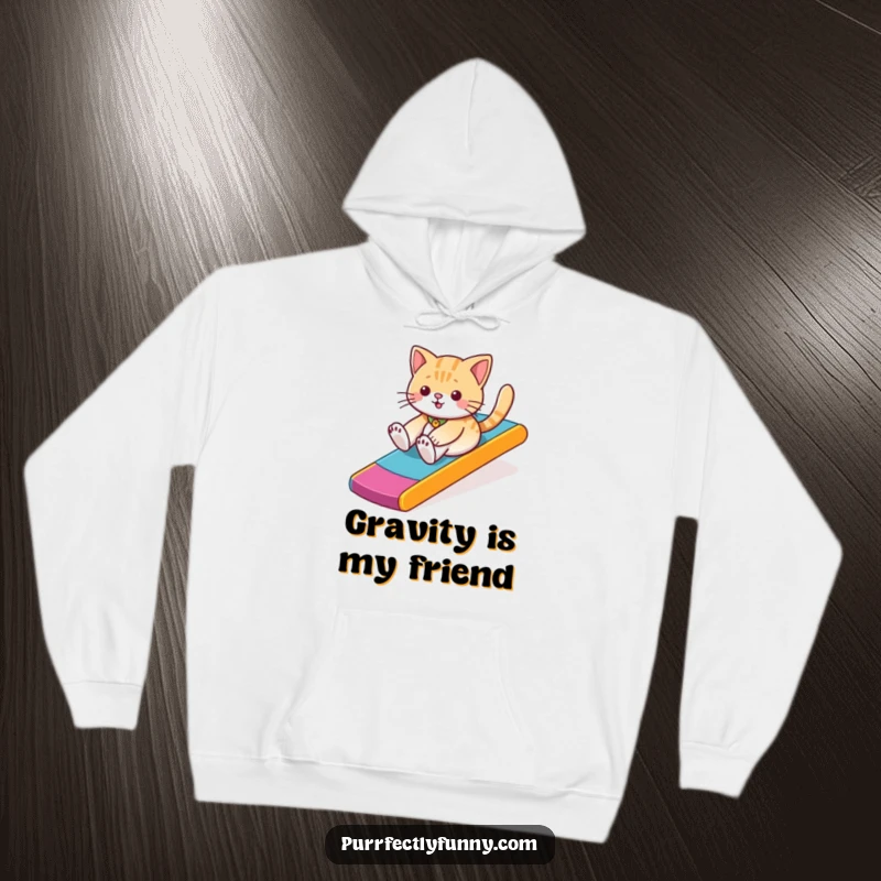 Warm hoodie featuring a humorous illustration of a cat joyfully sliding down a vivid, multi-colored ramp.