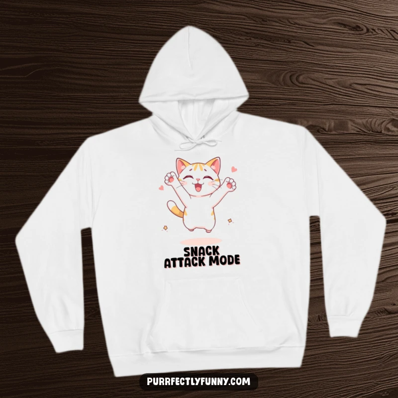 Funny cat hoodie: a cat character leaping enthusiastically with outstretched paws, aiming for an unseen treat, full of joy.