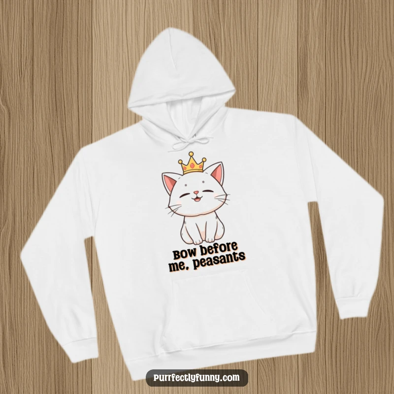 Funny hoodie featuring a proud cat in a miniature crown, looking incredibly pleased with itself.