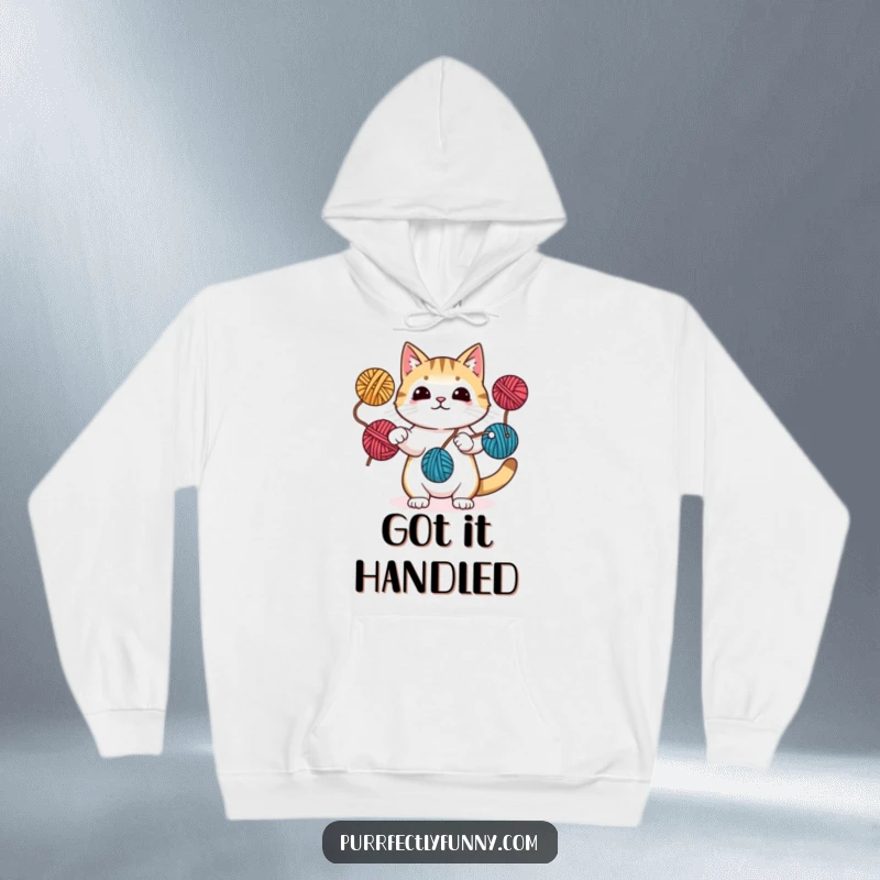 Funny hoodie depicting a cat juggling yarn balls with its paws and tail, perfect for expressing a playful and skilled personality.
