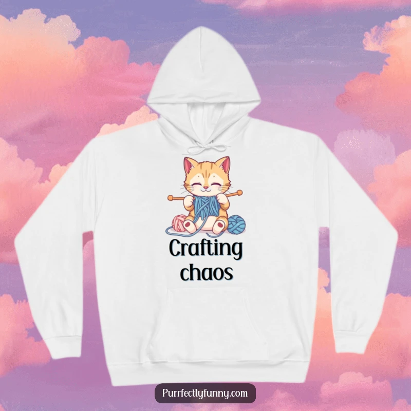 Funny cat knitting with oversized supplies on a warm and humorous funny hoodie, perfect for crafters.