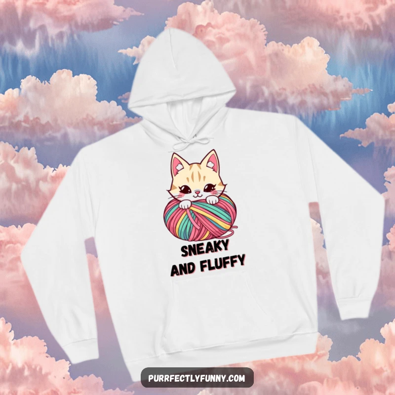 Funny hoodie featuring a cat with a sly, mischievous grin hiding behind a large, colorful ball of yarn.