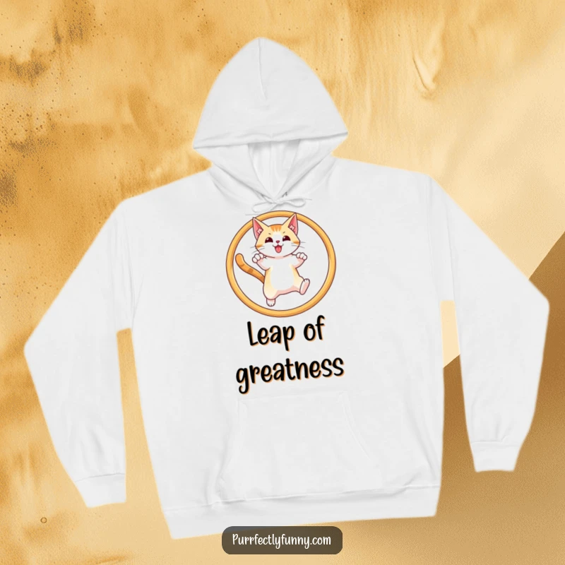 Funny, warm hoodie featuring a cat gracefully leaping through a hoop with a triumphant expression, embodying success.