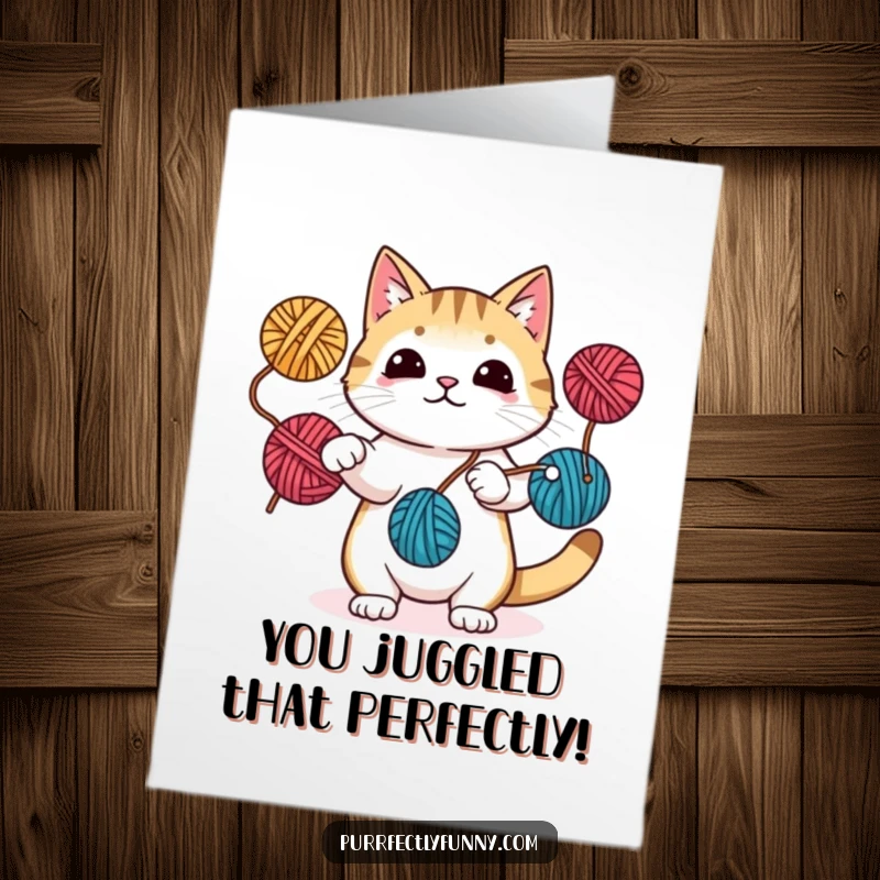 Funny Free Printable Congratulations Card: A skilled cat effortlessly juggles yarn balls, celebrating someone's fantastic accomplishment.
