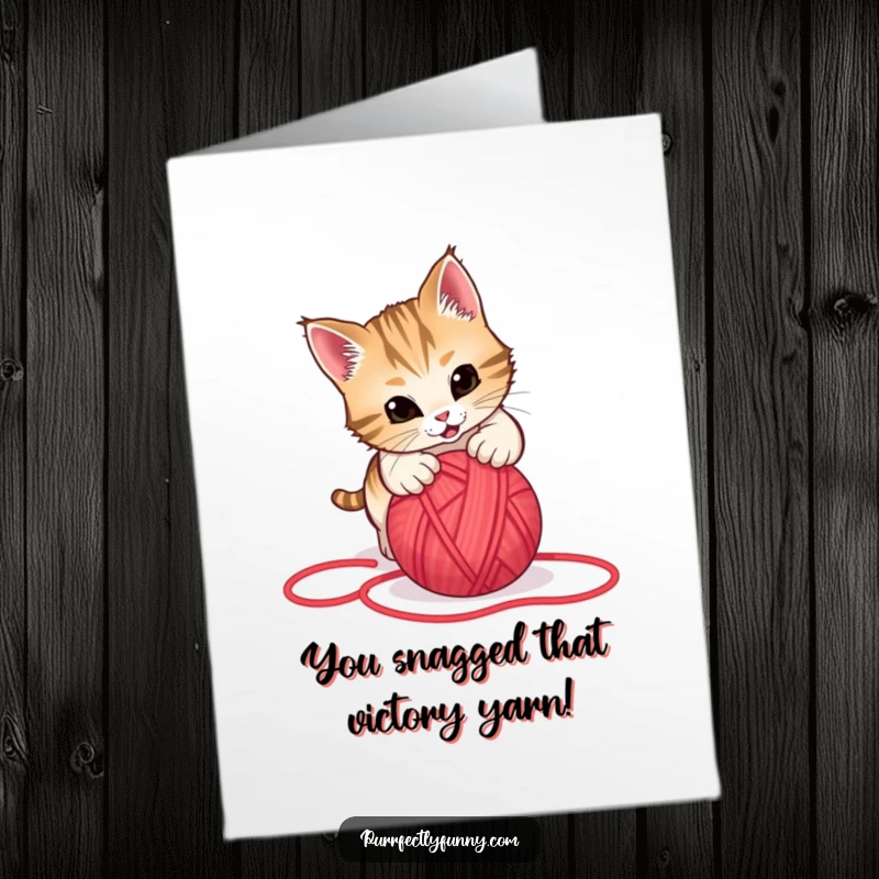 Funny Free Printable Congratulations Card: Cat mid-pounce, enthusiastically attacking a rolling red yarn ball, pure joy.
