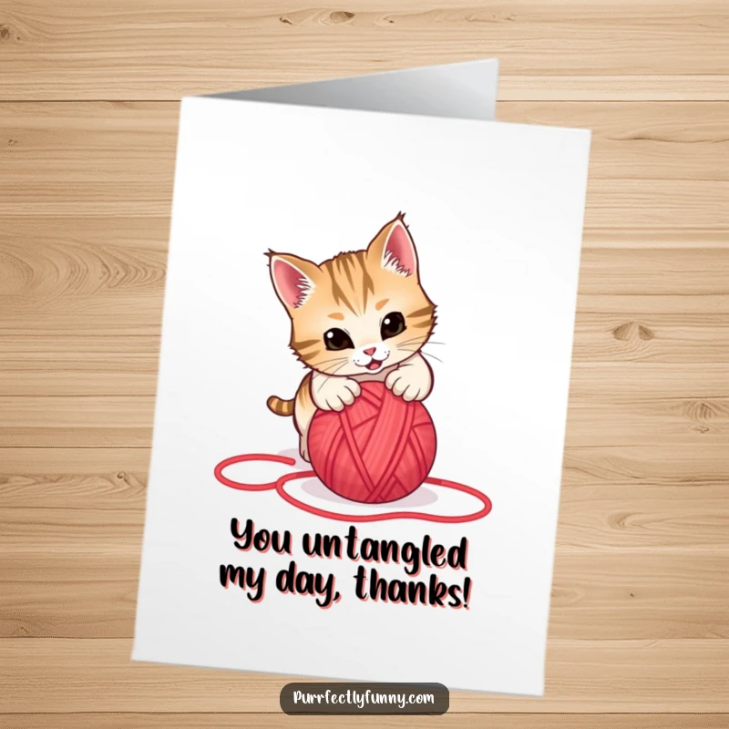 Funny Free Printable Thank You Card: Cat playfully attacking a rolling red yarn ball, captured mid-action.