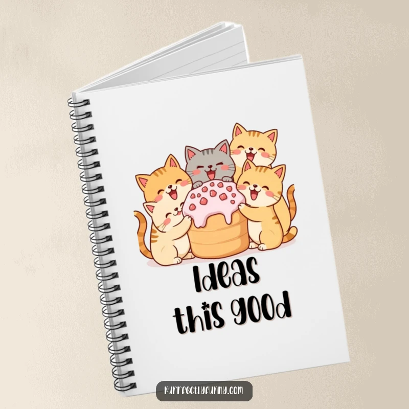 Funny notebook with simplified cats celebrating a large treat, perfect for writing and drawing.