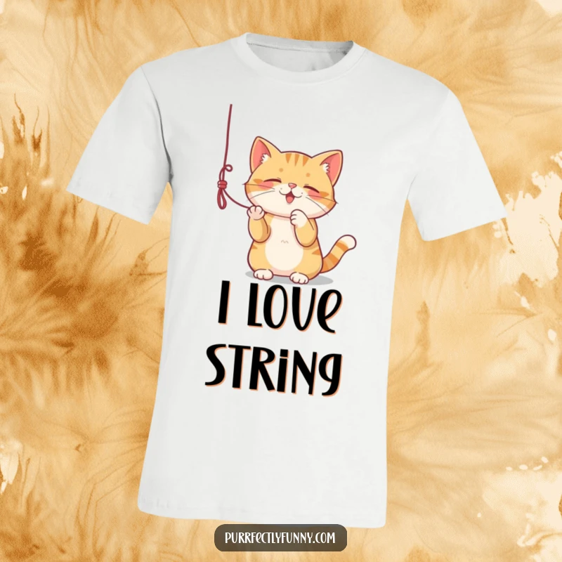 Funny t-shirt illustrating a cat enthusiastically playing with a dangling string, capturing playful energy.