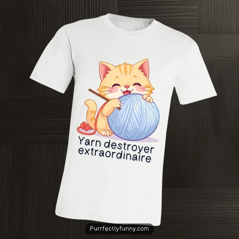 Funny Cat T-Shirt: A graphic of a cat gleefully batting a large, smiling ball of yarn, radiating pure joy.