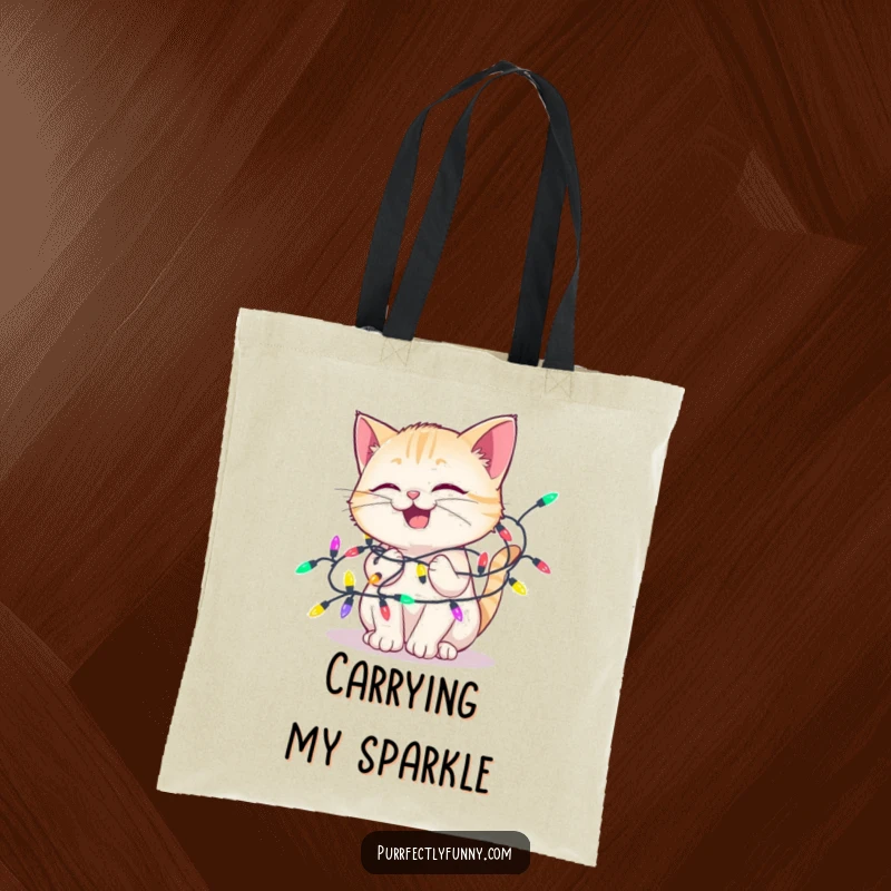 Funny tote bag designed with a delighted cat tangled in colorful holiday lights, perfect for carrying items with festive humor.
