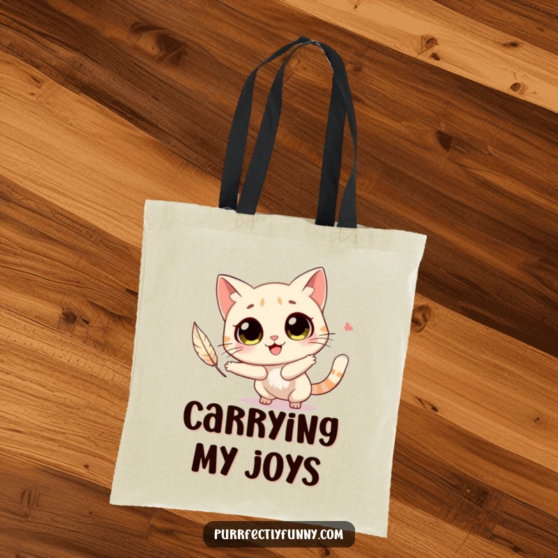 Funny cat with big, round eyes joyfully chasing a feather, depicted on a durable and stylish tote bag.