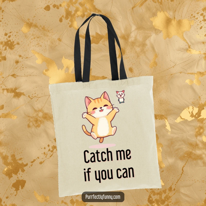 Funny tote bag featuring a simplified cat character in a dynamic leap, paws ready to grab the elusive floating toy.