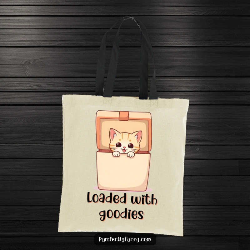 Funny Tote Bag showcasing an excited cat peeking from a massive gift box, perfect for carrying essentials with a side of humor.